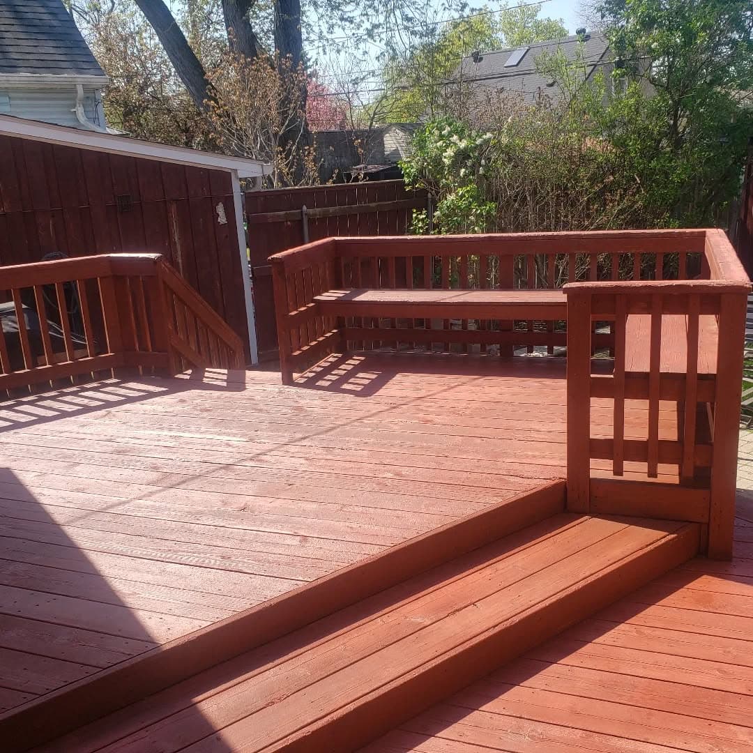 Deck freshly stained in Barn Red semi-transparent stain