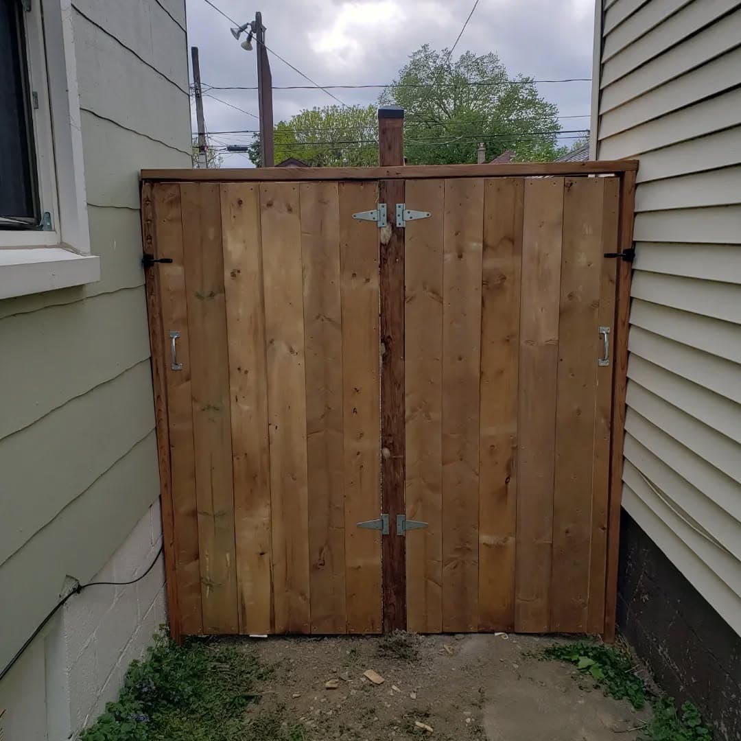 Custom gate built to match the horizontal fence