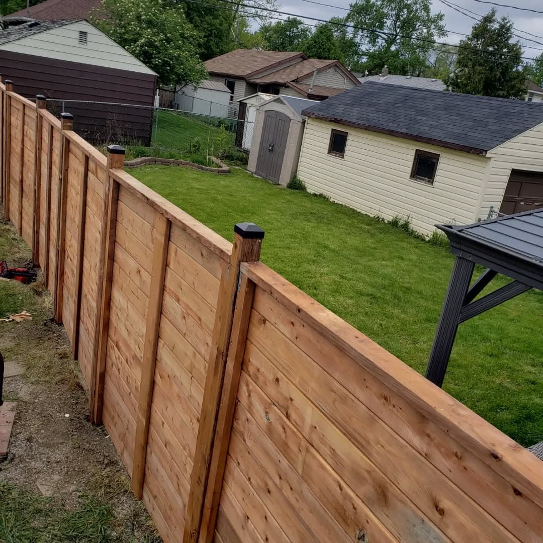 Horizontal picket fence along a property line